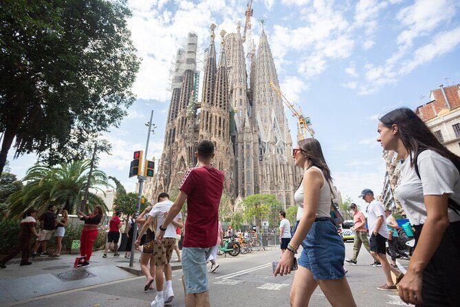 Guided Tour Sagrada Familia and Park Guell - Entering Sagrada Família: skip-the-line, strict dress code, and big details